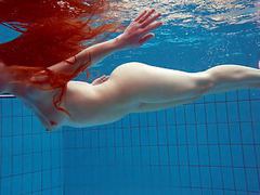 KiloMatures presents: Redhead simonna showing her body underwater