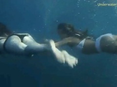 KiloMatures presents: Bikini girls filmed underwater in the ocean