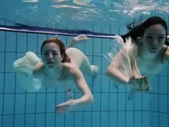 KiloMatures presents: Nearly naked girls go swimming in the pool