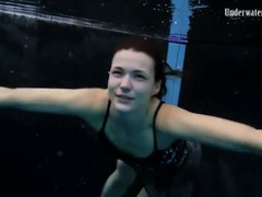 KiloMatures presents: Beautiful girl swims and smiles underwater