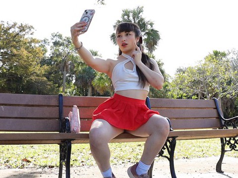 KiloMatures presents: Gorgeous solo college babe doing striptease in a park - pixie