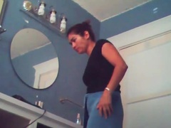 KiloMatures presents: Voyeur camera captures naked chick in bathroom