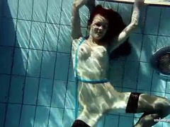 KiloMatures presents: In black stockings pretty girl goes for a swim