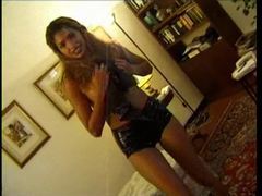 KiloMatures presents: Chick changes into her sexy latex shorts