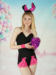 KiloMatures presents: This tight blonde bunny has some smoking hot fun with stripping her clothes and playing with her flower