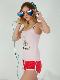KiloMatures presents: This doll really knows how to have fun with her and how she can show off her pussy and listen to some beats at the same time.