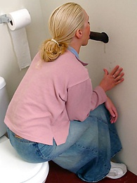 KiloMatures presents: Blonde girl Jamie sits on the toilet and blows a black gloryhole dong